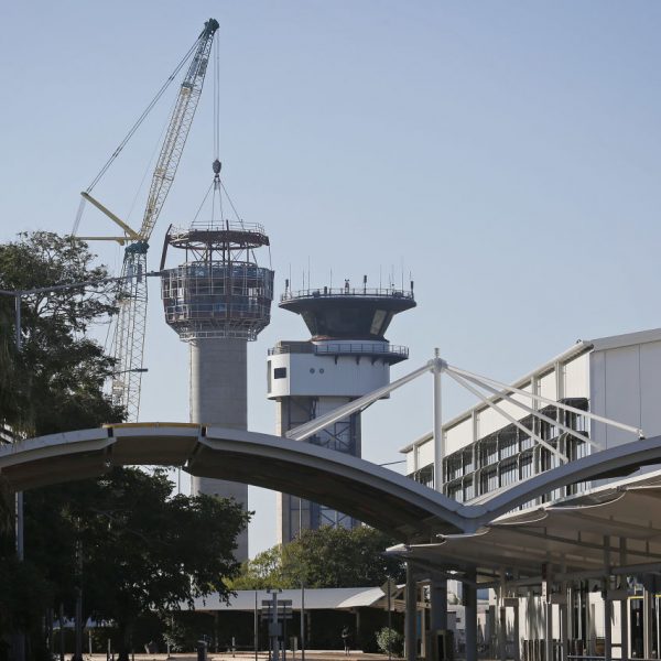 The main cabin piece is lowered into place, as part of the new Air Traffic Control Tower at RAAF Base Darwin. *** Local Caption *** Under the joint Defence / Airservices Australia OneSKY program, a completely new fit-out of state-of-the-art Air Traffic Control (ATC) equipment necessitated the construction of a new ATC tower at RAAF Base Darwin. Defence contractors Lendlease commenced works in July 2019 at the site of the joint military and civilian airfield (also leased by Darwin International Airport). The project will enable the seamless and continued delivery of Air Traffic Services for the region.

Royal Australian Air Force Air Traffic Controllers and Communications Electronics Technicians from Number 452 Squadron who support both military and civilian air movements (both domestic and international) will transfer to the new facility once installation of ATC systems and software are complete.  The new tower and accompanying facilities are essential infrastructure to continue to safely manage ground and airspace operations around RAAF Base Darwin.