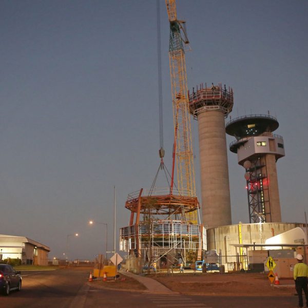 The main cabin piece is prepared for lifting into place, as part of the new Air Traffic Control Tower at RAAF Base Darwin. *** Local Caption *** Under the joint Defence / Airservices Australia OneSKY program, a completely new fit-out of state-of-the-art Air Traffic Control (ATC) equipment necessitated the construction of a new ATC tower at RAAF Base Darwin. Defence contractors Lendlease commenced works in July 2019 at the site of the joint military and civilian airfield (also leased by Darwin International Airport). The project will enable the seamless and continued delivery of Air Traffic Services for the region.

Royal Australian Air Force Air Traffic Controllers and Communications Electronics Technicians from Number 452 Squadron who support both military and civilian air movements (both domestic and international) will transfer to the new facility once installation of ATC systems and software are complete.  The new tower and accompanying facilities are essential infrastructure to continue to safely manage ground and airspace operations around RAAF Base Darwin.